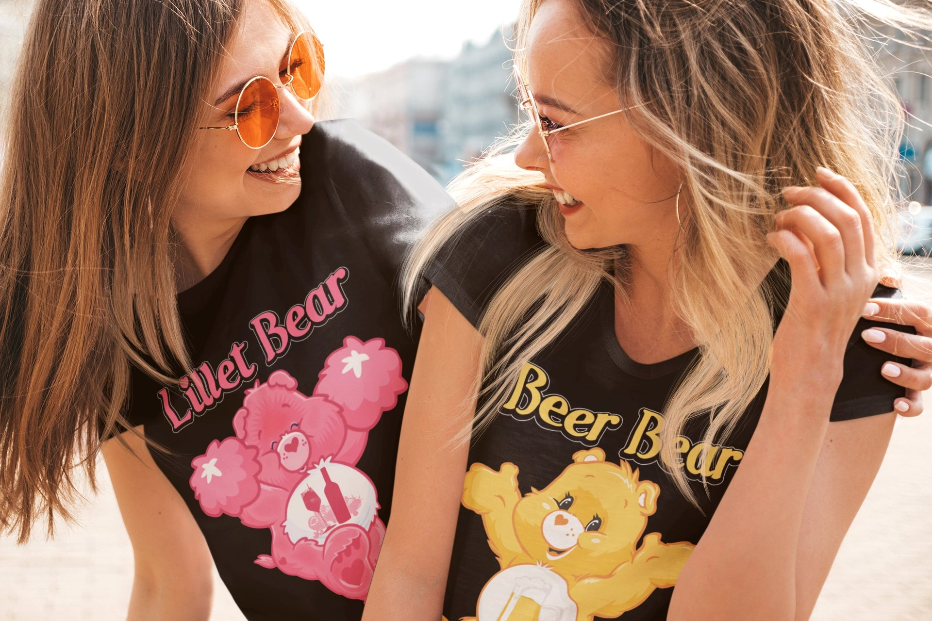 Two young woman wearing bear shirts